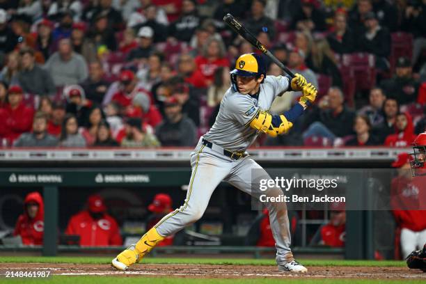 Christian Yelich of the Milwaukee Brewers bats against the Cincinnati Reds in the seventh inning of a game at Great American Ball Park on April 09,...