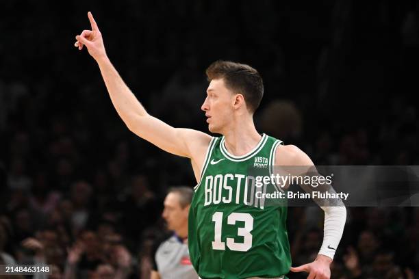 Drew Peterson of the Boston Celtics reacts after scoring a three-point basket against the Charlotte Hornets during the fourth quarter at the TD...