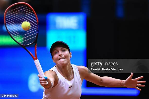 Tatjana Maria of Germany returns a shot to Laura Pigossi of Brazil during the Billie Jean King Cup Qualifier match between Brazil and Germany at...