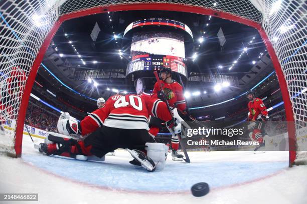 Arvid Soderblom of the Chicago Blackhawks allows a goal by Filip Forsberg of the Nashville Predators during the second period at the United Center on...