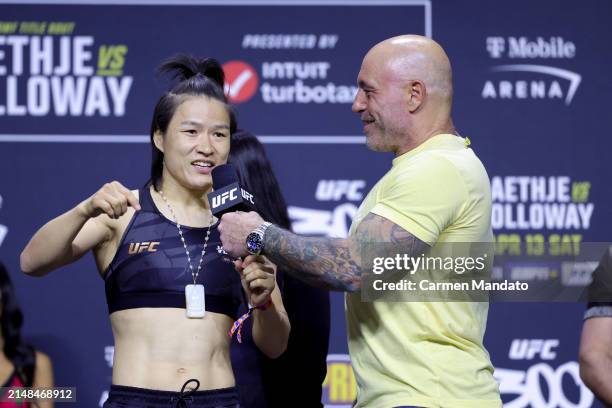 Joe Rogan interviews Zhang Weili of China during the UFC 300 ceremonial weigh-in at MGM Grand Garden Arena on April 12, 2024 in Las Vegas, Nevada.