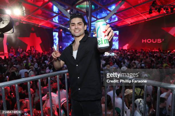 Diego Tinoco enjoys a Heineken Silver at the Heineken House at the 2024 Coachella Valley Music and Arts Festival on Friday, April 12th in Indio,...