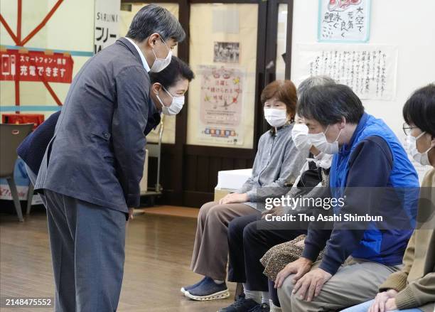 Emperor Naruhito and Empress Masako talk with evacuees on April 12, 2024 in Anamizu, Ishikawa, Japan.