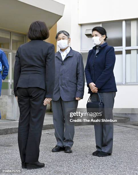 Emperor Naruhito and Empress Masako are seen on arrival at Matsunami Junior High School where local residents take shelter on April 12, 2024 in Noto,...