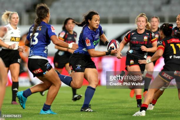 Ruahei Demant of the Blues runs the ball during the Super Rugby Aupiki Final between the Blues and the Chiefs Manawa at Eden Park on April 13, 2024...