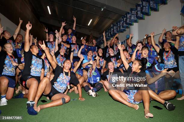 The Blues celebrate in the changing room following the Super Rugby Aupiki Final between the Blues and the Chiefs Manawa at Eden Park on April 13,...