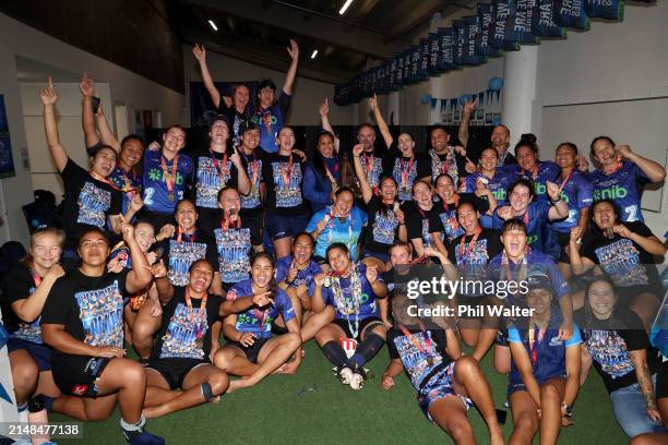 The Blues celebrate in the changing room following the Super Rugby Aupiki Final between the Blues and the Chiefs Manawa at Eden Park on April 13,...