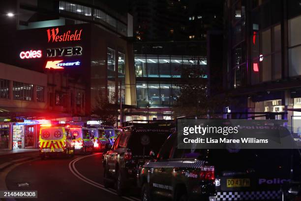 Police and ambulance vehicles line the streets outside Westfield Bondi Junction on April 13, 2024 in Bondi Junction, Australia. Five victims, plus...