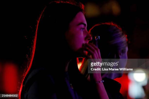 Members of the public look on outside Westfield Bondi Junction on April 13, 2024 in Bondi Junction, Australia. Five victims, plus the offender, are...