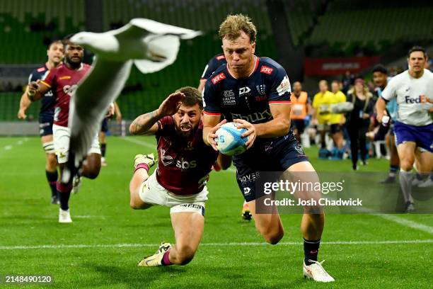 Darby Lancaster of the Rebels scores a try during the round eight Super Rugby Pacific match between Melbourne Rebels and Highlanders at AAMI Park, on...