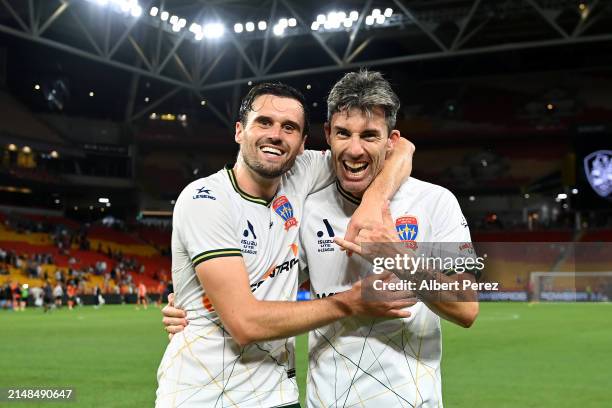 Carl Jenkinson and Jason Hoffman of Newcastle celebrate the victory during the A-League Men round 24 match between Brisbane Roar and Newcastle Jets...