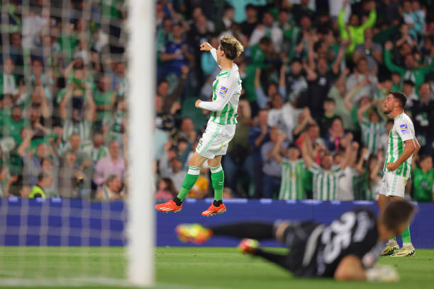 Juan Miranda of Real Betis celebrates after scoring the teams first goal during the LaLiga EA Sports match between Real Betis and Celta Vigo at...