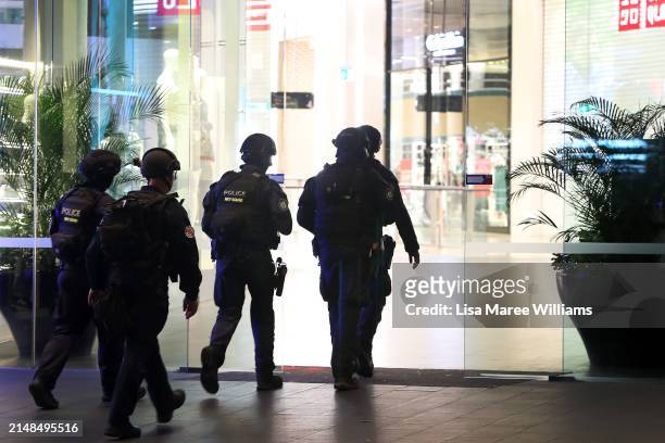 Police are seen entering Westfield Bondi Junction on April 13, 2024 in Bondi Junction, Australia. Six victims, plus the offender, are confirmed dead...