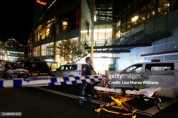 Paramedic moves an empty stretcher outside Westfield Bondi Junction on April 13, 2024 in Bondi Junction, Australia. Six victims, plus the offender,...