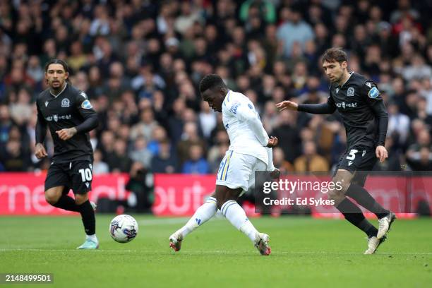 Wilfried Gnonto of Leeds United passes the ball whilst under pressure from Harry Pickering of Blackburn Rovers during the Sky Bet Championship match...