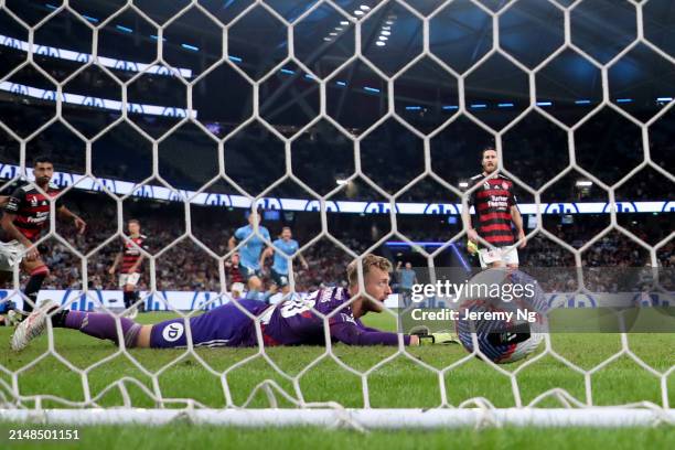 Goalkeeper Lawrence Thomas of the Wanderers looks on after conceding a goal during the A-League Men round 24 match between Sydney FC and Western...