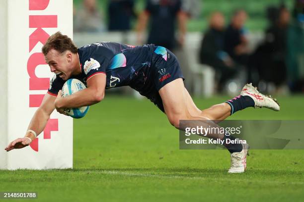 Darby Lancaster of the Rebels scores a try during the round eight Super Rugby Pacific match between Melbourne Rebels and Highlanders at AAMI Park, on...