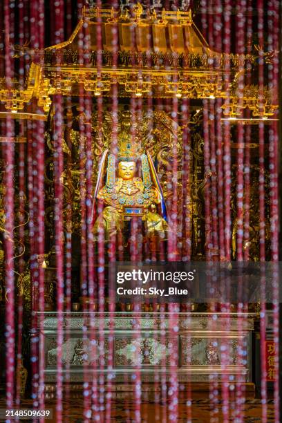 buddha statue in buddhist temple in lijiang, yunnan - lijiang stock pictures, royalty-free photos & images