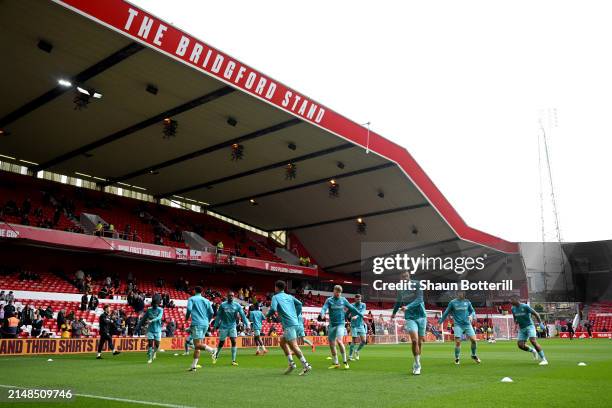 General view of Wolverhampton Wanderers players warming up prior to the Premier League match between Nottingham Forest and Wolverhampton Wanderers at...