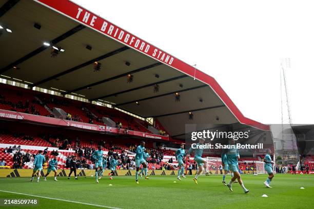 General view of Wolverhampton Wanderers players warming up prior to the Premier League match between Nottingham Forest and Wolverhampton Wanderers at...