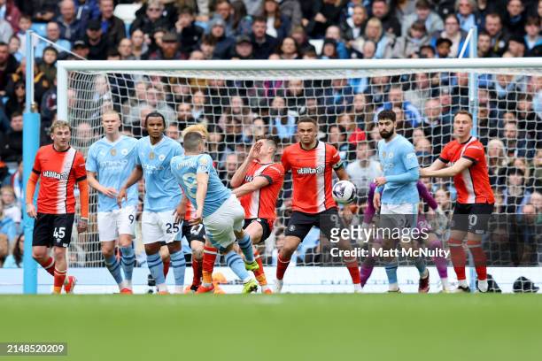 Mateo Kovacic of Manchester City scores his team's second goal during the Premier League match between Manchester City and Luton Town at Etihad...