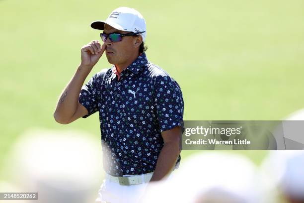 Rickie Fowler of the United States walks across the eighth hole during the third round of the 2024 Masters Tournament at Augusta National Golf Club...