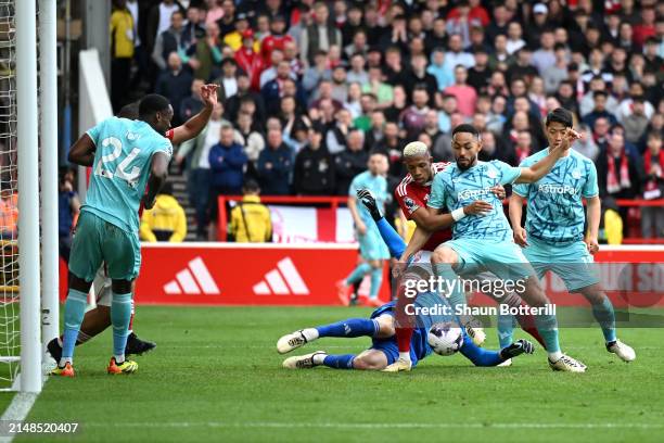 Matheus Cunha of Wolverhampton Wanderers scores his team's second goal during the Premier League match between Nottingham Forest and Wolverhampton...