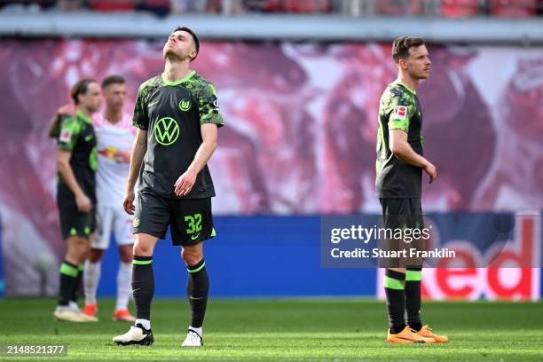 Mattias Svanberg of VfL Wolfsburg looks dejected following the team's defeat during the Bundesliga match between RB Leipzig and VfL Wolfsburg at Red...