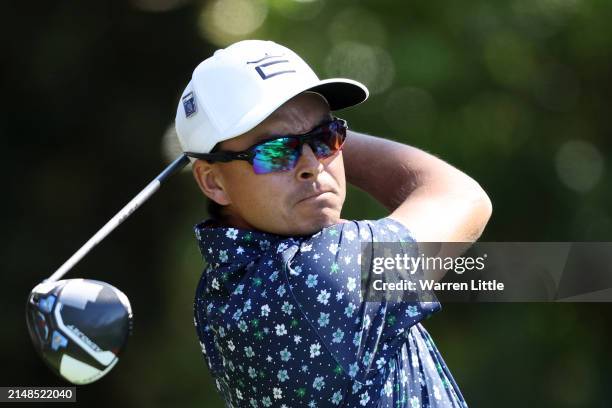 Rickie Fowler of the United States plays his shot from the 11th tee during the third round of the 2024 Masters Tournament at Augusta National Golf...