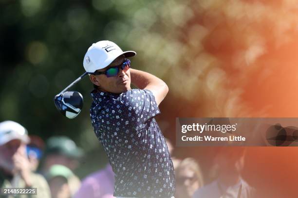 Rickie Fowler of the United States plays his shot from the 10th tee during the third round of the 2024 Masters Tournament at Augusta National Golf...