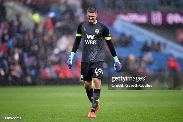 Arijanet Muric of Burnley looks dejected during the Premier League match between Burnley FC and Brighton & Hove Albion at Turf Moor on April 13, 2024...