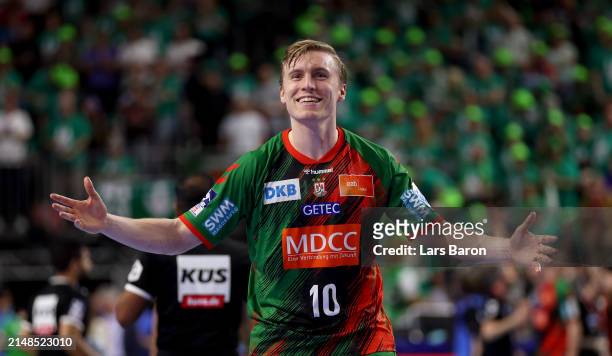 Gisli Thorgeir Kristjansson of Magdeburg celebrates after winning the REWE Final4 match between SC Magdeburg and Füchse Berlin at Lanxess Arena on...