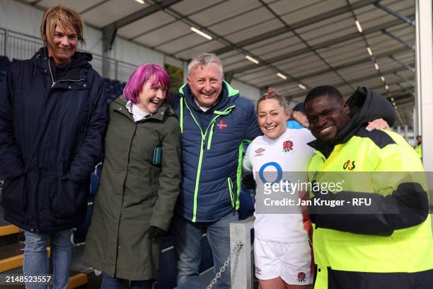 Natasha Hunt of England poses family and friends following the Guinness Women's Six Nations 2024 match between Scotland and England at Hive Stadium -...