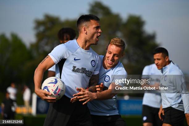 Lautaro Martinez of FC Internazionale, Davide Frattesi of FC Internazionale in action during the FC Internazionale training session at the club's...