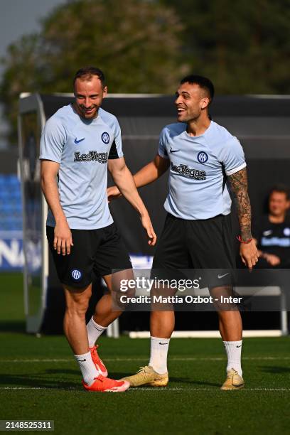 Carlos Augusto of FC Internazionale, Lautaro Martinez of FC Internazionale in action during the FC Internazionale training session at the club's...