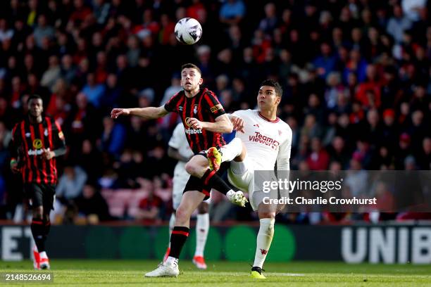 Ryan Christie of AFC Bournemouth and Casemiro of Manchester United battle for the ball during the Premier League match between AFC Bournemouth and...