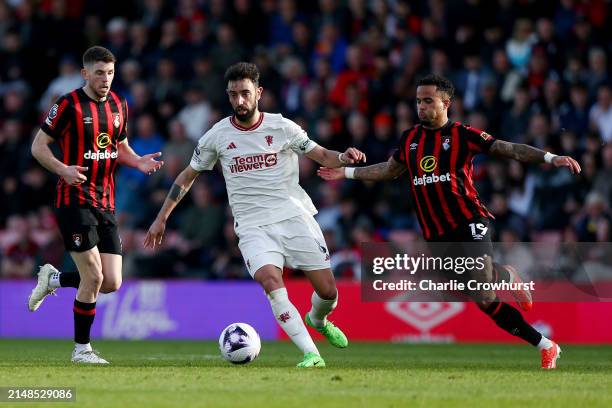 Bruno Fernandes of Manchester United controls the ball whilst under pressure from Justin Kluivert of AFC Bournemouth during the Premier League match...