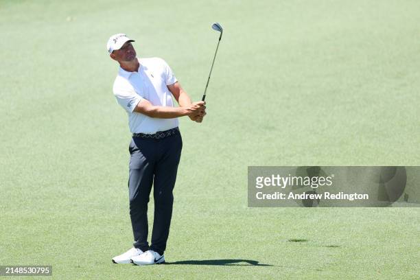Lucas Glover of the United States plays his shot on the second hole during the third round of the 2024 Masters Tournament at Augusta National Golf...