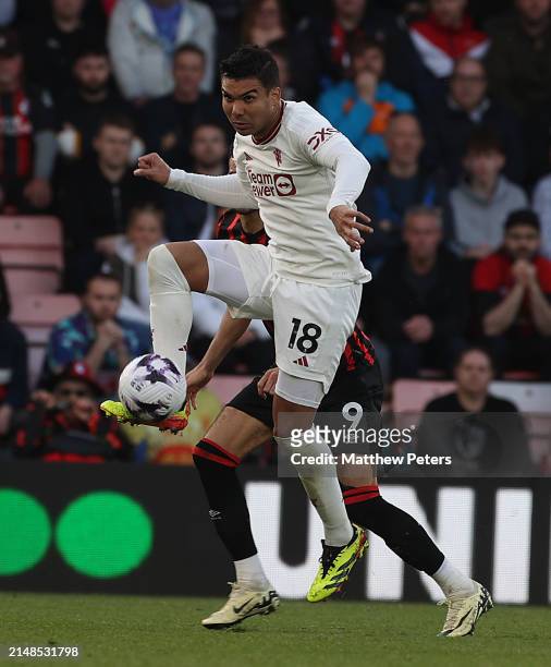 Casemiro of Manchester United in action with Dominic Solankei of AFC Bournemouth during the Premier League match between AFC Bournemouth and...