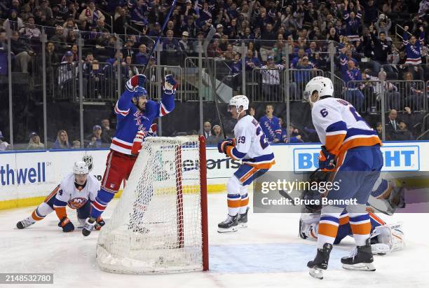 Chris Kreider of the New York Rangers celebrates a second period shorthanded goal by Braden Schneider against the New York Islanders at Madison...