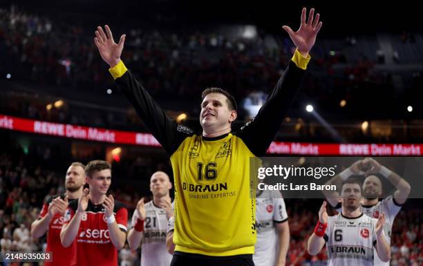 Goalkeeper Nebojsa Simic of Melsungen celebrates after winning the REWE Final4 match between SG Flensburg-Handewitt and MT Melsungen at Lanxess Arena...