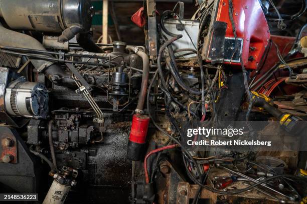 The partly disassembled engine of a 1984 Case farm tractor is seen April 5, 2024 at the LaBerge Brothers Farm in Charlotte, Vermont.