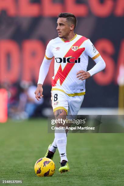 Oscar Trejo of Rayo Vallecano runs with the ball during the LaLiga EA Sports match between Rayo Vallecano and Getafe CF at Estadio de Vallecas on...