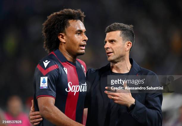 Thiago Motta, Head Coach of Bologna FC, speaks with Joshua Zirkzee of Bologna FC during the Serie A TIM match between Bologna FC and AC Monza at...