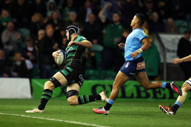 Alex Coles of Northampton Saints goes over to score his team's fifth try during the Investec Champions Cup Quarter Final match between Northampton...