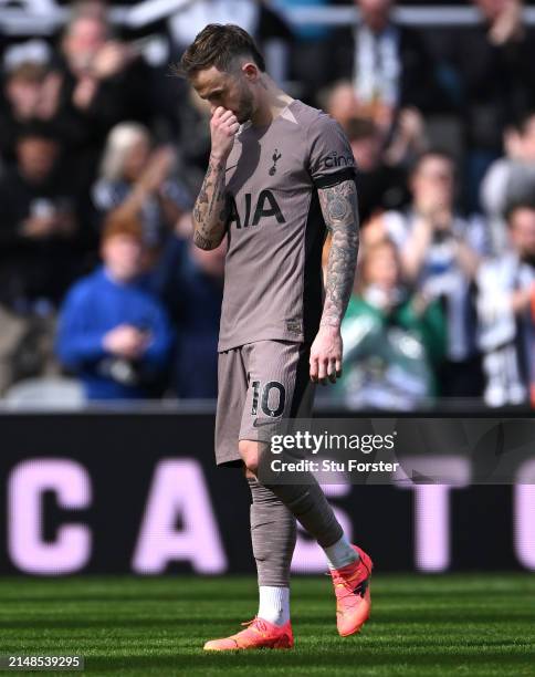 Tottenham Hotspur player James Maddison reacts dejectedly after the Premier League match between Newcastle United and Tottenham Hotspur at St. James...