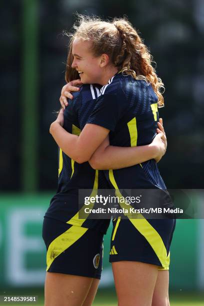 Tiree Burchill of Scotland celebrates after scoring with Mia McAuley of Scotland during the UEFA Women's U19 European Championship Qualifier match...