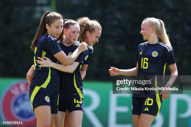 Tiree Burchill of Scotland celebrates after scoring with Mia McAuley of Scotland, Rachel Murchie of Scotland and Mason Clark of Scotland during the...