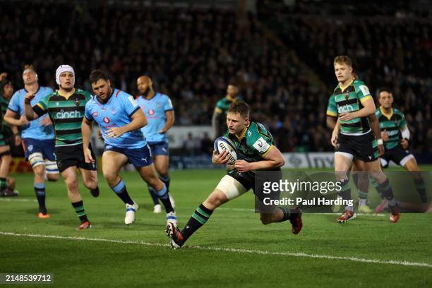 Fraser Dingwall of Northampton Saints runs to score his team's seventh try during the Investec Champions Cup Quarter Final match between Northampton...