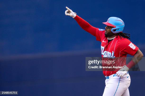 Josh Bell of the Miami Marlins rounds the bases after a homerun in the first inning against the Atlanta Braves at loanDepot park on April 13, 2024 in...